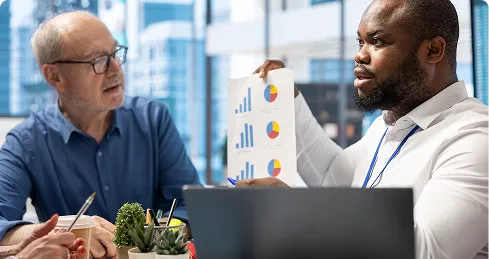 VasyERP’s consultant giving ROI analysis to client